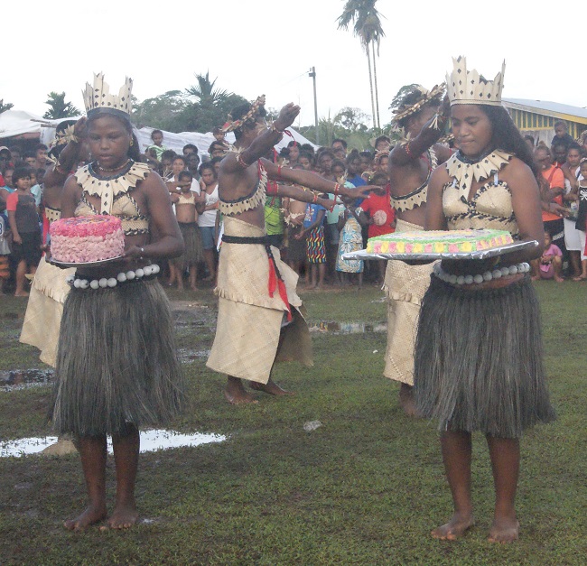 Wagina cultural dancing girls with ordination cakes